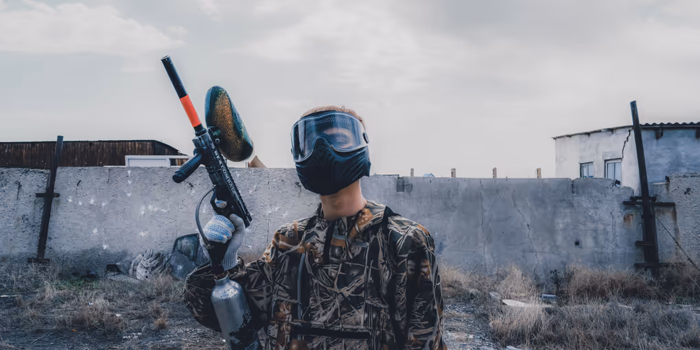 https://unsplash.com/photos/man-wearing-mask-holding-paintball-gun-during-daytime--s54WNv_3UM